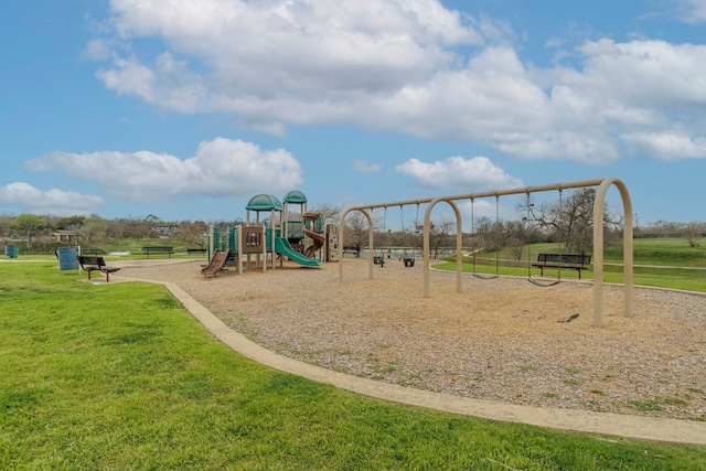 view of playground featuring a yard