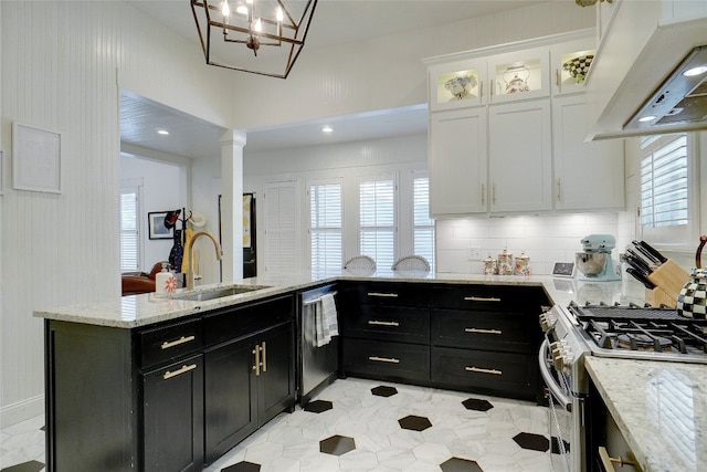 kitchen with tasteful backsplash, custom exhaust hood, stainless steel appliances, sink, and white cabinetry