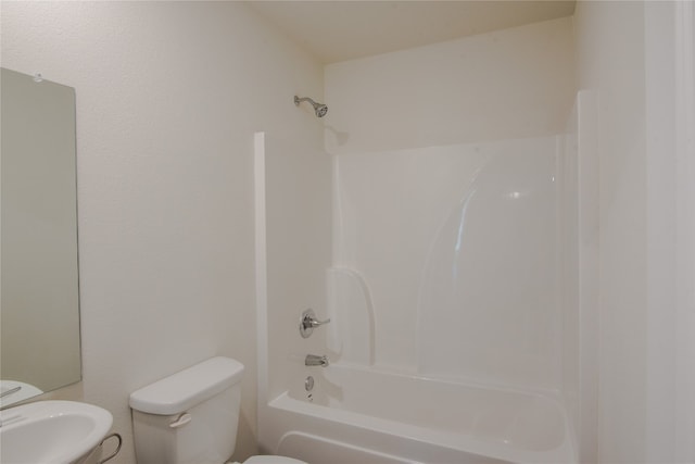 full bathroom with  shower combination, toilet, and sink