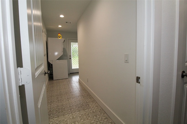 hallway featuring light tile flooring