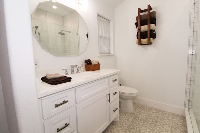 bathroom with tile flooring, a shower with door, toilet, and oversized vanity