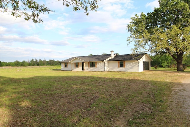 ranch-style home with a front yard