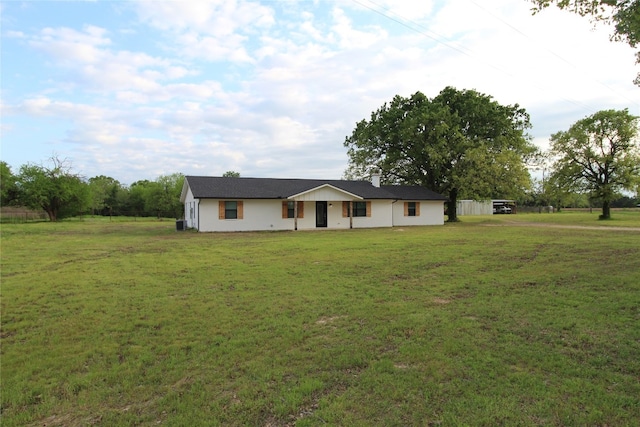 single story home with a front lawn