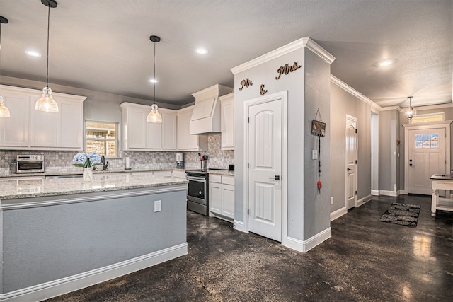 kitchen with white cabinets, pendant lighting, stainless steel electric range, and custom range hood