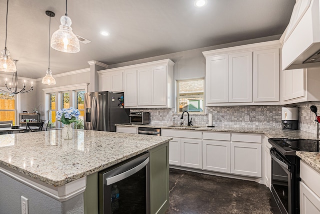 kitchen with wine cooler, tasteful backsplash, stainless steel appliances, and crown molding