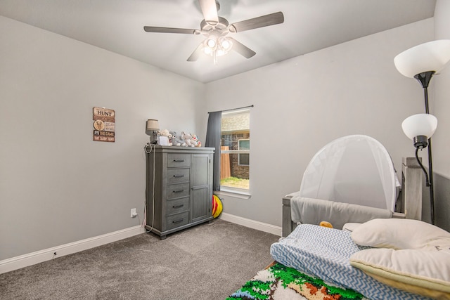 bedroom with dark carpet and ceiling fan