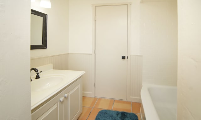 bathroom with tile floors and vanity