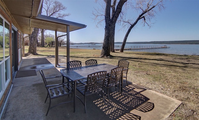 view of patio featuring a water view