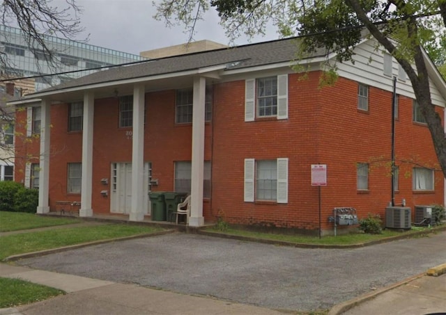 view of property featuring central AC unit