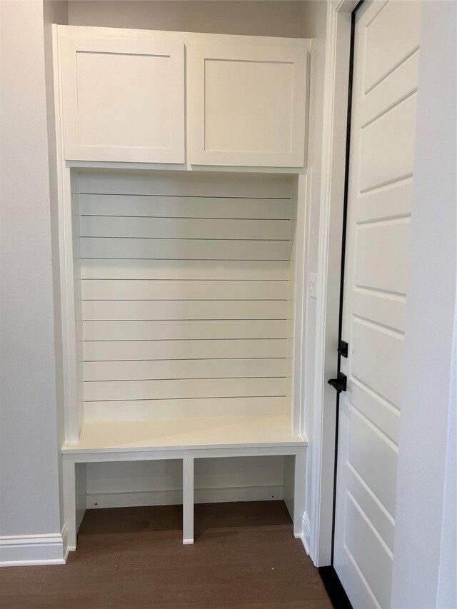 washroom featuring cabinets, hookup for a washing machine, and hookup for an electric dryer