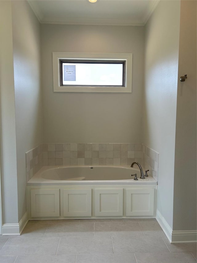 bathroom featuring crown molding, a tub, and tile patterned floors