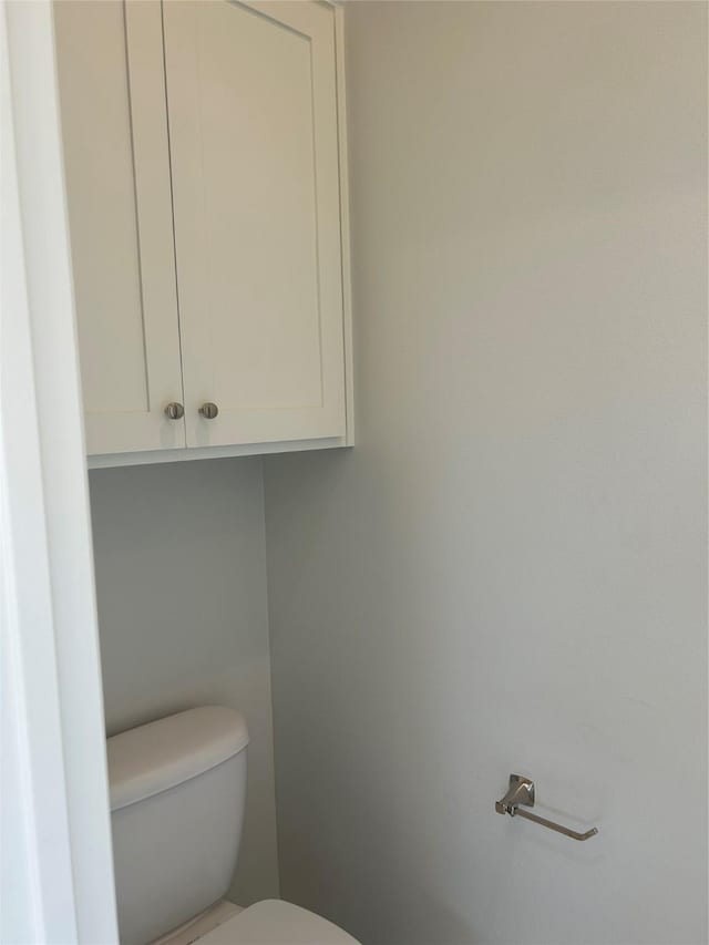 bathroom featuring toilet