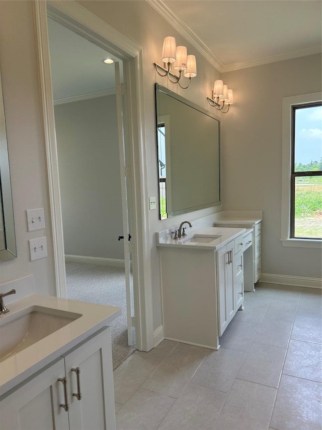 bathroom with vanity, crown molding, and tile patterned floors