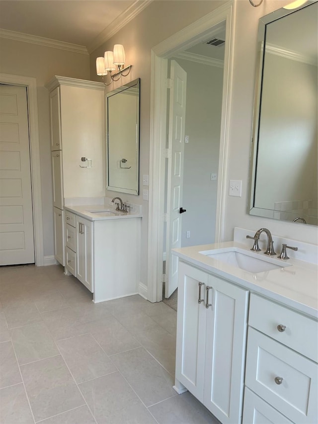 full bathroom featuring crown molding, two vanities, and a sink