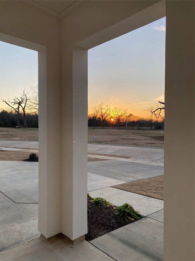 view of patio terrace at dusk