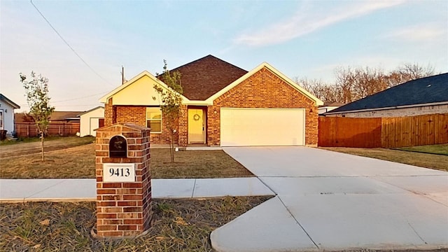 single story home featuring a garage