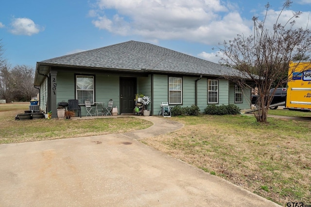 view of front of home with a front yard