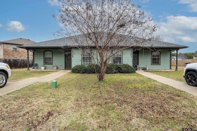 single story home with a front lawn