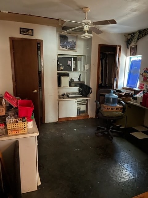 interior space featuring ceiling fan