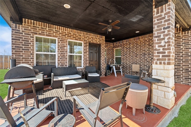 view of terrace featuring ceiling fan, grilling area, and an outdoor hangout area