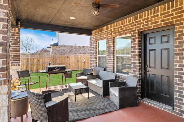 exterior space with ceiling fan and an outdoor hangout area