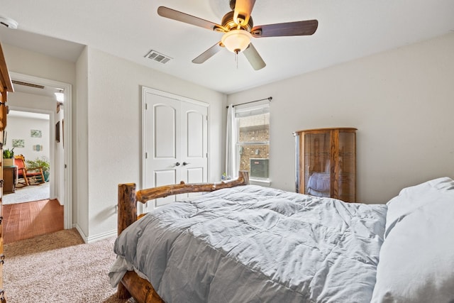 bedroom with ceiling fan, a closet, and carpet floors