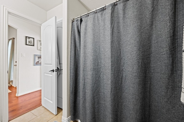 bathroom featuring wood-type flooring