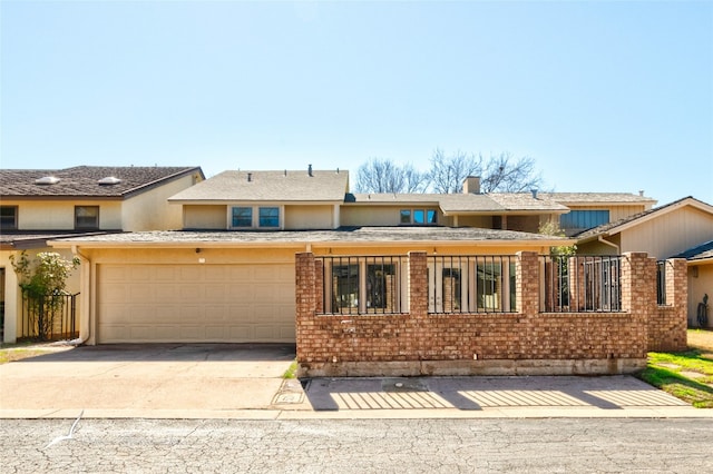 townhome / multi-family property featuring a garage