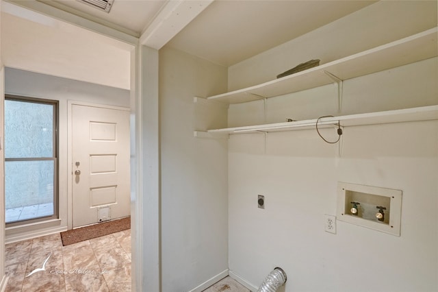 laundry room with washer hookup, electric dryer hookup, and light tile flooring