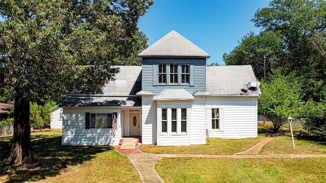 view of front of house with a front lawn