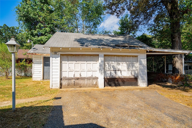 garage with a yard