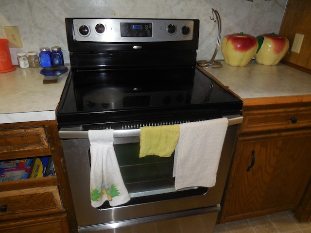 kitchen featuring stainless steel range with electric cooktop