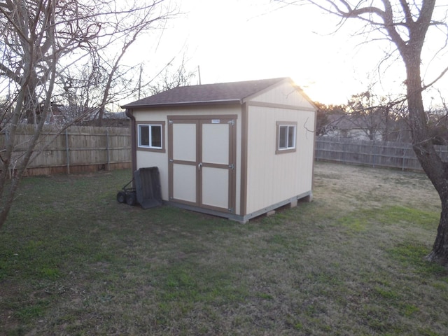 view of outdoor structure with a lawn