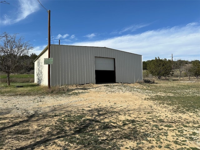 view of outdoor structure with a garage