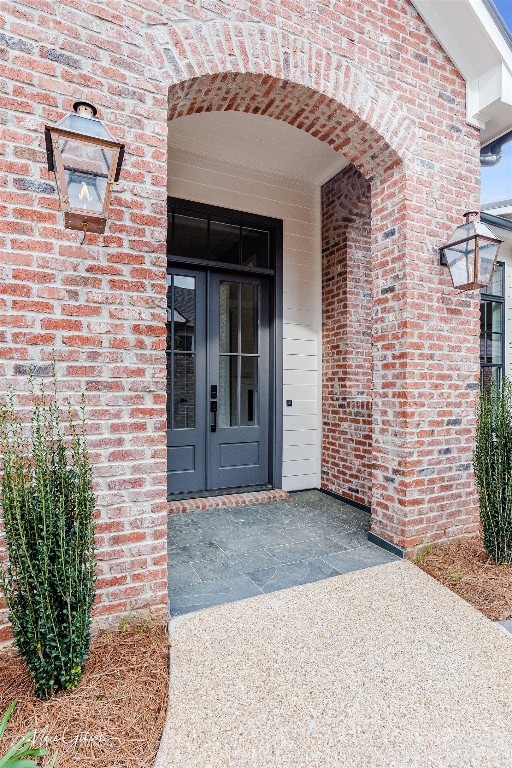 entrance to property featuring french doors