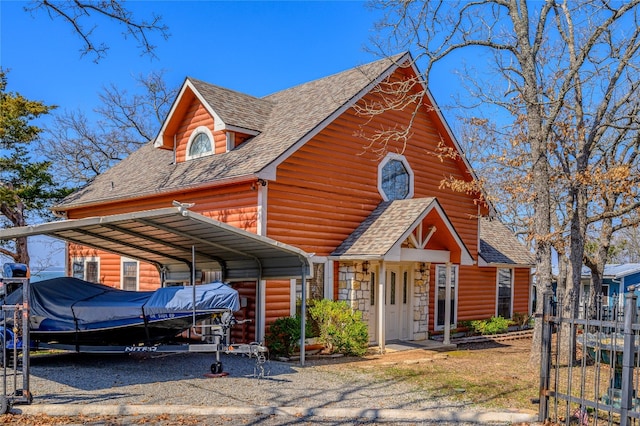 log-style house with a carport