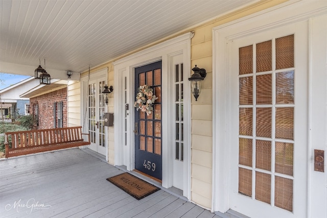 entrance to property with a porch