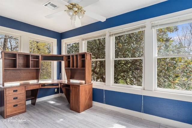 office area with ceiling fan and light hardwood / wood-style floors