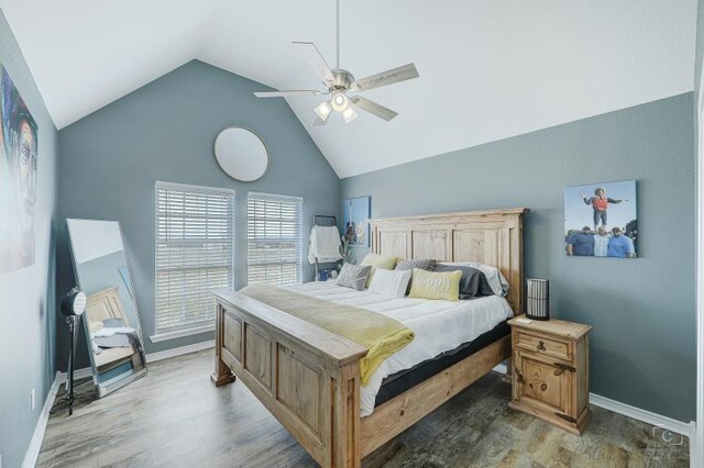 full bathroom with large vanity, a textured ceiling, toilet, wood-type flooring, and shower / bathtub combination with curtain