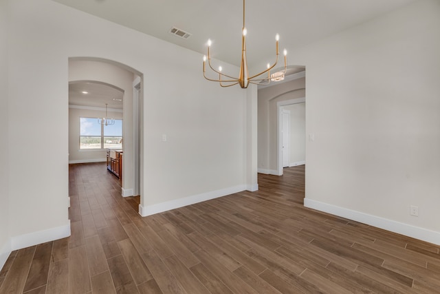 kitchen featuring ceiling fan, dishwasher, a center island with sink, and a stone fireplace