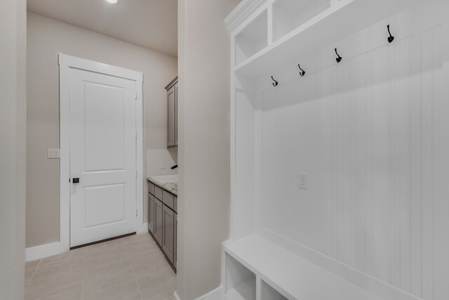 mudroom featuring light tile patterned flooring