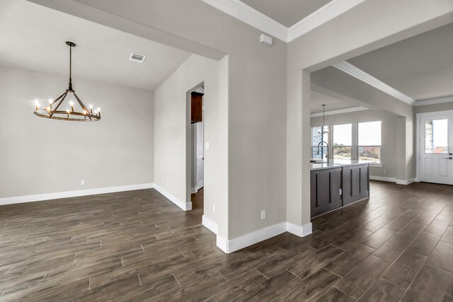 unfurnished living room with a fireplace, ceiling fan, and crown molding