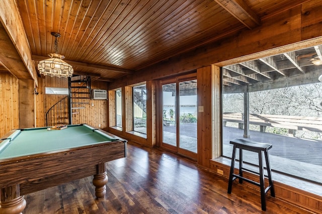 recreation room featuring wood ceiling, wood finished floors, beamed ceiling, wood walls, and a wall mounted AC