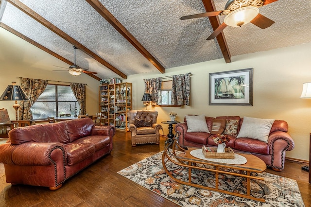 living room featuring a ceiling fan, vaulted ceiling with beams, a textured ceiling, and wood finished floors