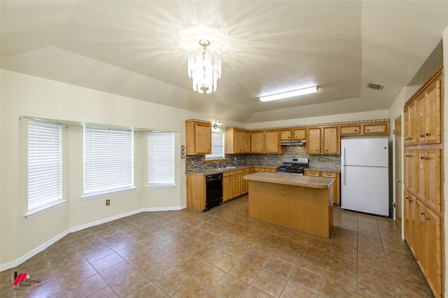 kitchen with a center island, white refrigerator, stainless steel gas stove, light tile flooring, and dishwasher