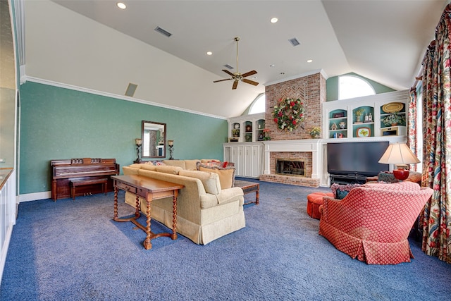 living room with ceiling fan, brick wall, a fireplace, and high vaulted ceiling