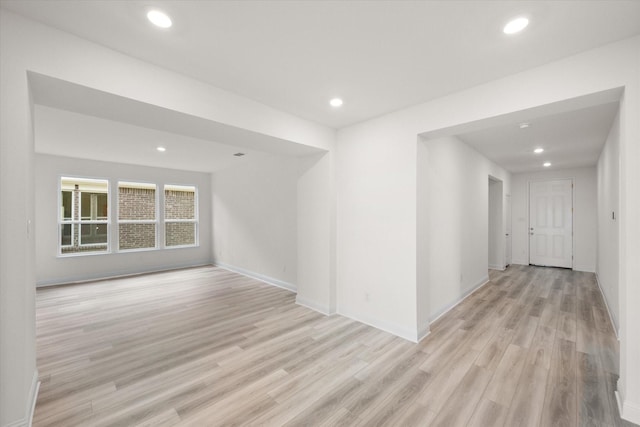 unfurnished room with light hardwood / wood-style flooring