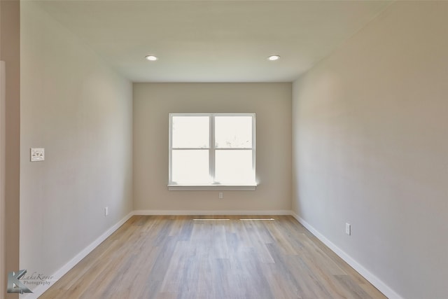 empty room featuring light hardwood / wood-style floors