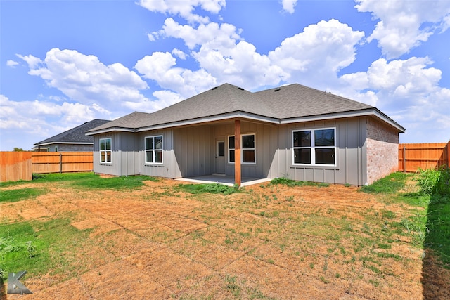 back of property featuring a patio area