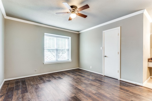 unfurnished room featuring ceiling fan, a textured ceiling, wood finished floors, baseboards, and crown molding